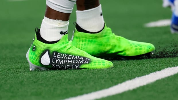View of lime green cleats.
